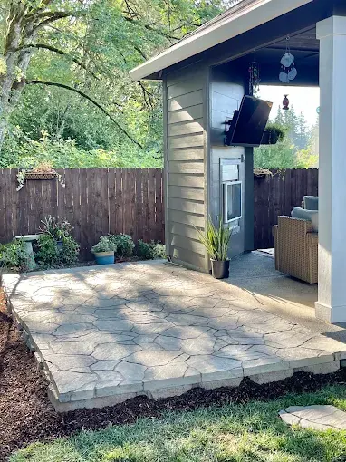 Concrete patio furnished as an outdoor seating area